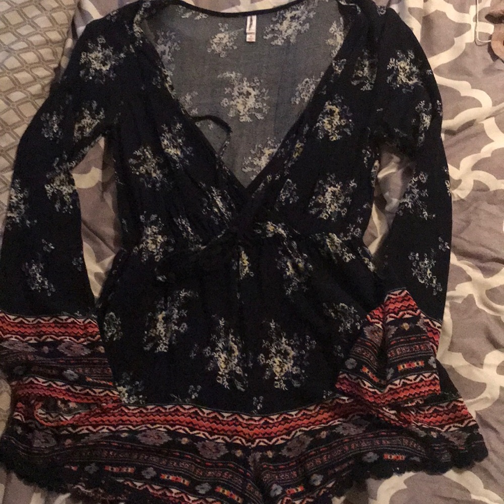 Cute floral shorts romper.